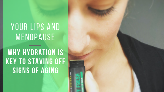 woman applying lip balm